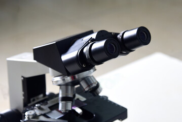 microscope is an optical instrument capable of enlarging images of very small objects, analyzing diseases clinical health research laboratory