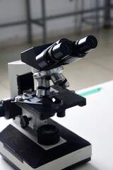 Fototapeta na wymiar microscope is an optical instrument capable of enlarging images of very small objects, analyzing diseases clinical health research laboratory