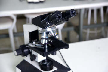 Fototapeta na wymiar microscope is an optical instrument capable of enlarging images of very small objects, analyzing diseases clinical health research laboratory