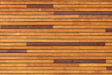 Wooden wall made of different toned planks, photo background