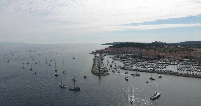 Aerial view, yachts leave the bay to the starting point of the regatta rolex cup 2019