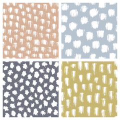 Set of abstract hand drawn seamless patterns, brush strokes textures