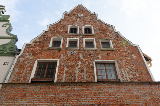 This image shows a beautiful half-timbered house in Wismar, Germany.