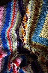 Close Up of a Multicolour Crochet Knitted Blnket in Vintage Design