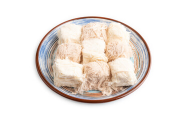 traditional arabic sweets pishmanie isolated on white, side view.