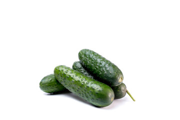 Ripe fresh green cucumbers isolated on a white background