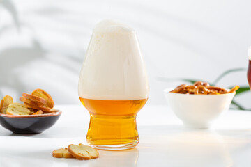 One glass with light craft beer food and drink