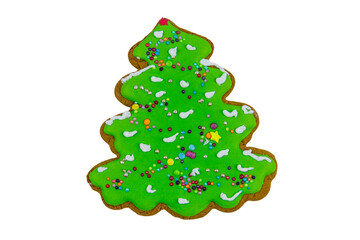 Christmas gingerbread cookie made in shape of Christmas tree isolated on white background
