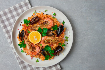 Seafood paella, shrimp and mussels risotto, rice, homemade, top view, no people,