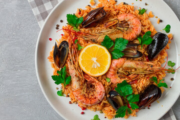 Seafood paella, shrimp and mussels risotto, rice, homemade, top view, no people,