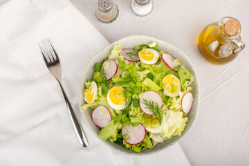 egg vegetables salad green leaves mix spinach, arugula, lettuce on the table wholesome food healthy meal snack copy space food background rustic. top view keto or paleo diet veggie or vegetarian