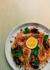 Seafood paella, shrimp and mussels risotto, rice, homemade, top view, no people,
