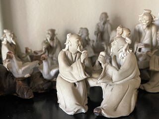 Antique Japanese figures on a shelf