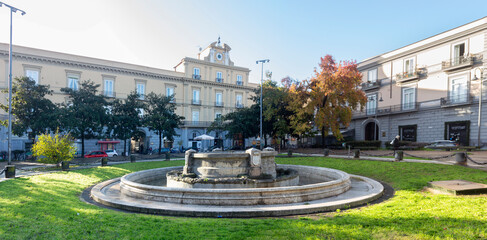 December 4, 2022  Aversa, V. Emanuele III square with fountain and Candia  palace