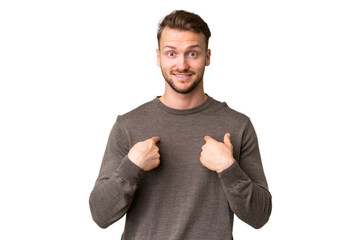 Young handsome caucasian man over isolated chroma key background with surprise facial expression