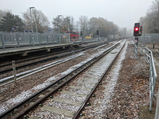 Fototapeta na wymiar A Railway Train Station Line Tracks on a Frosty Morning Transport