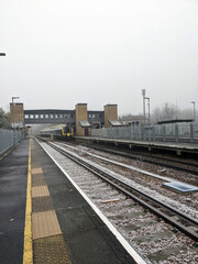 Fototapeta na wymiar A Railway Train Station Line Tracks on a Frosty Morning Transport