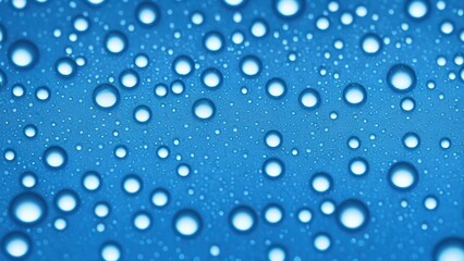 Naklejka na ściany i meble Blue background with water drops.
