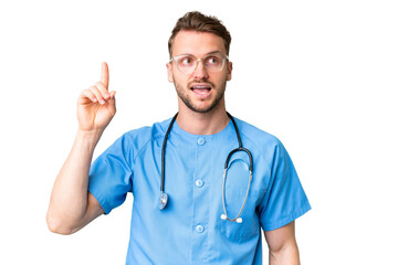 Young nurse man over isolated chroma key background intending to realizes the solution while...