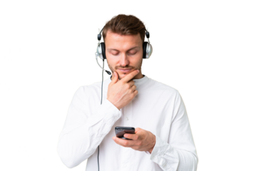 Telemarketer caucasian man working with a headset over isolated chroma key background thinking and sending a message