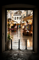 Greek village with rain in frame