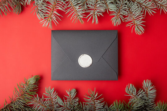 Photography from above of gift certificate on green background.Blank invintation with negative space.