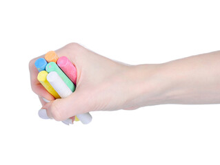 Fototapeta premium Multicolored crayons drawing in hand on white background isolation