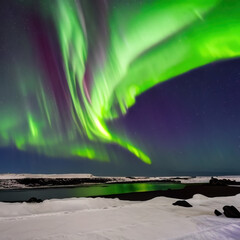 northern lights above snowy icy iceland landscape