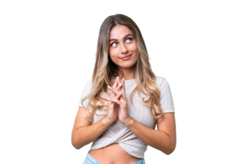 Young Uruguayan woman over isolated background scheming something