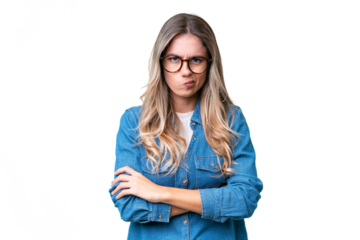 Young Uruguayan woman over isolated background with unhappy expression