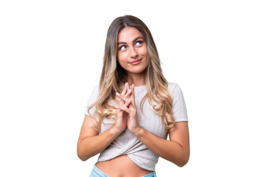 Young Uruguayan woman over isolated background scheming something