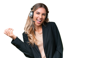 Telemarketer pretty Uruguayan woman working with a headset over isolated background making guitar gesture