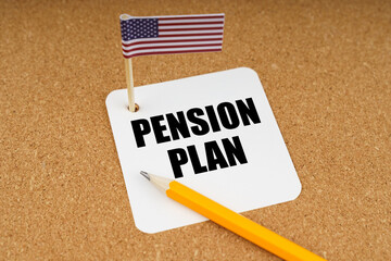 On the table is the US flag, a pencil and a sheet of paper with the inscription - pension plan