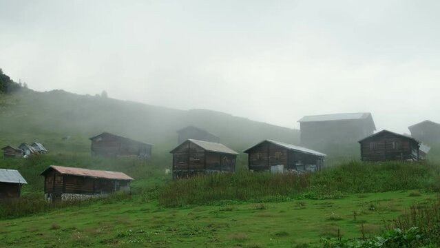 village houses visible through the mists. Life in the mountains. Mountain villages. Camlihemsin, Rize, Turkey