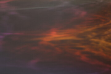 Holographic red neon abstract background with bokeh and light leaks. High quality photo