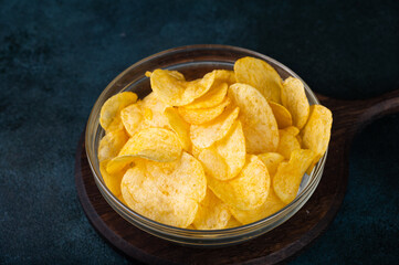 Potato chips. Traditional beer snacks. Fried potato. Unhealthy food