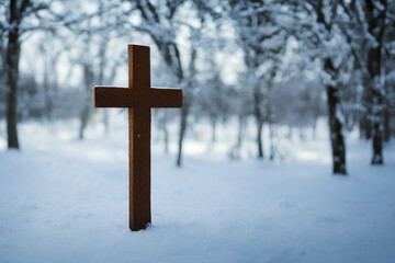 Realistic illustration of Christian cross outdoors in the snow, generative ai