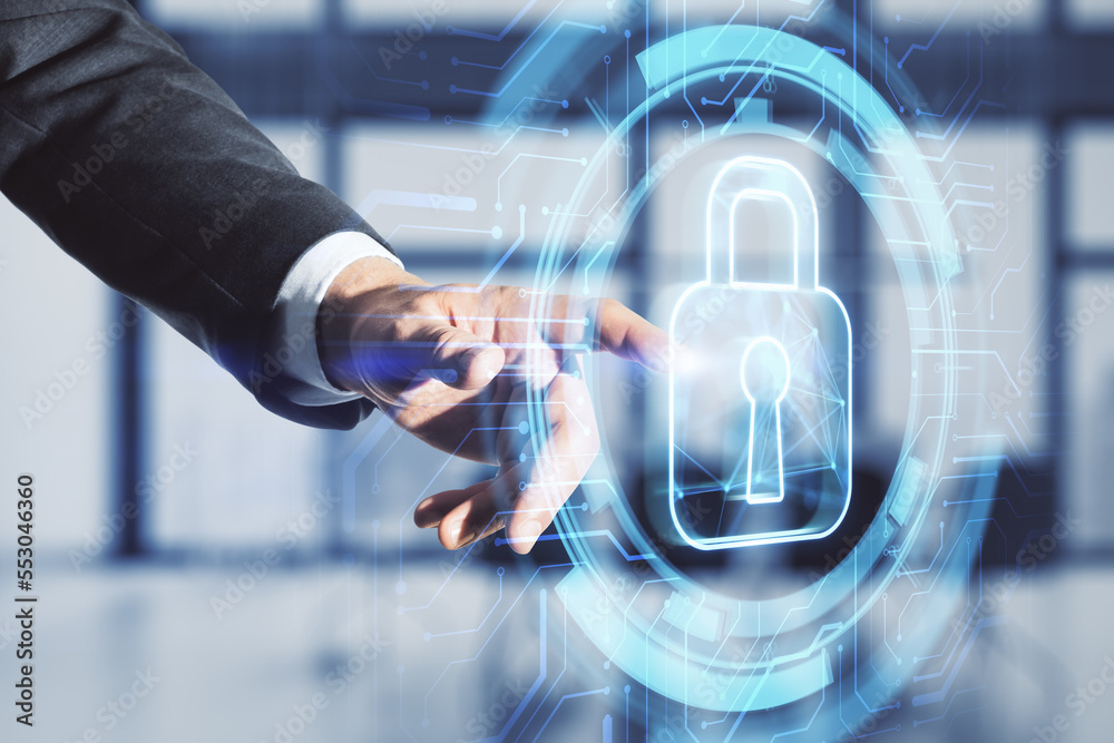Poster close up of businessman hand pointing at glowing secure padlock hologram on blurry background. prote