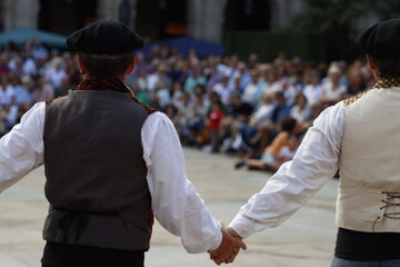 Basque folk dancers in an outdoor exhibition