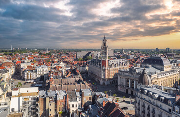 Cityscape of Lille (Hauts-de-france, Flanders, France) at sunset: Aerial skyline view of the historical Grand Place du Général-de-Gaulle, old town main square.  - obrazy, fototapety, plakaty