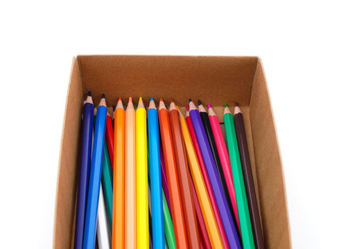 Many colorful pencils in a box.