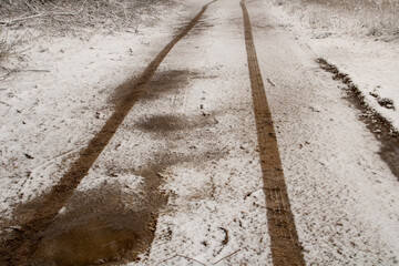 village road covered with the first snow