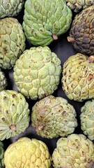 Ashta fruit. located throughout the frame. View from above. Background. Texture. copy space