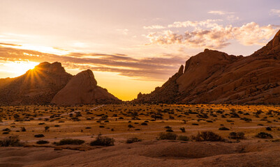 beautiful sunset in the Spitzkoppe national parka in Namibia - obrazy, fototapety, plakaty