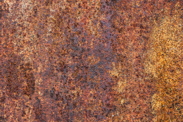 Dark light red rusty metal plate. Grunge texture. Rusty metal background. Rusty orange texture. Rust.