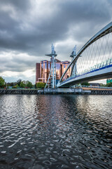 Foot bridge cross Manchester ship canal, connecting between Media City and Imperial War Museum at Salford quays in Manchester city, England	