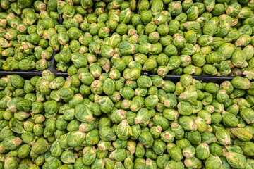 Brussels sprouts on display at a supermarket