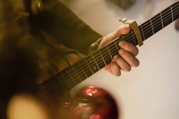 Man playing on the guitar 