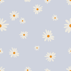 Seamless pattern of daises. Repeat ornament of chamomile spring flowers for textile design.
