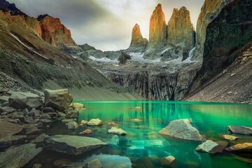 Torres Del Paine granites at sunrise and lake reflection, Chilean Patagonia - obrazy, fototapety, plakaty